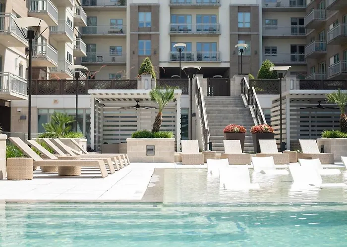 5 Min From Everything! Pool, Gym, Balcony